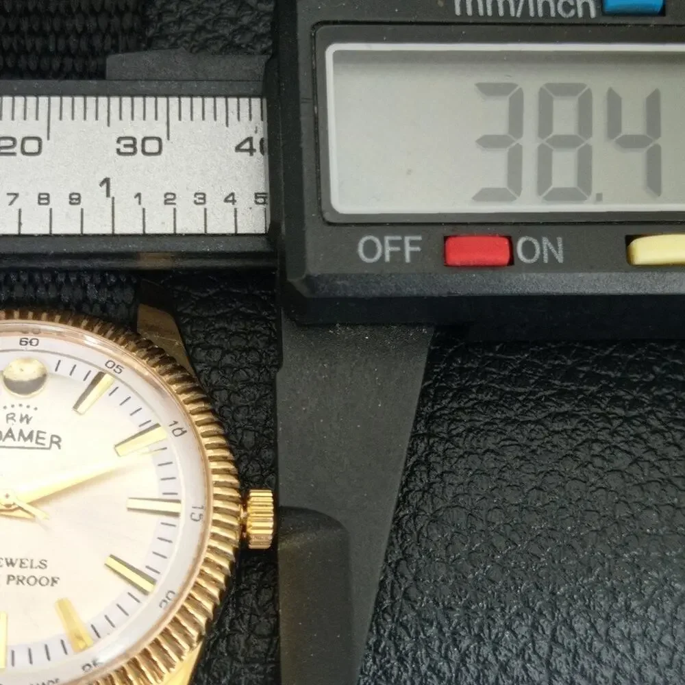 Vintage 1976 Roamer Manual Mens Gold Watch W/Nato Strap & White accents